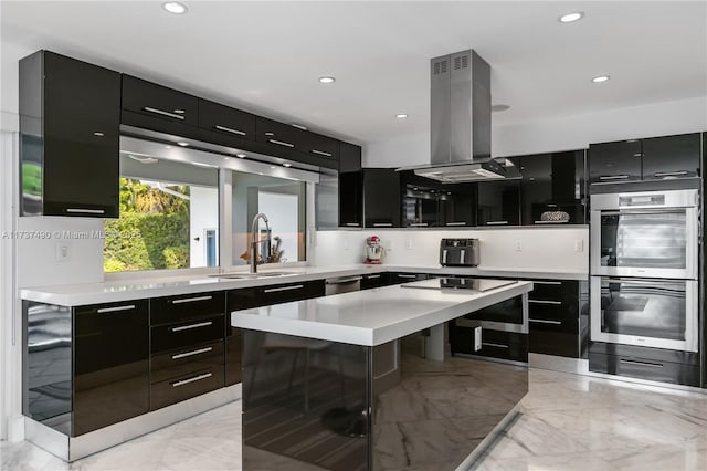 1251 Kane Concourse, Bay Harbor Islands, FL 33154 - kitchen featuring dark cabinets, appliances with stainless steel finishes, island exhaust hood, modern cabinets, and light marble finish floors