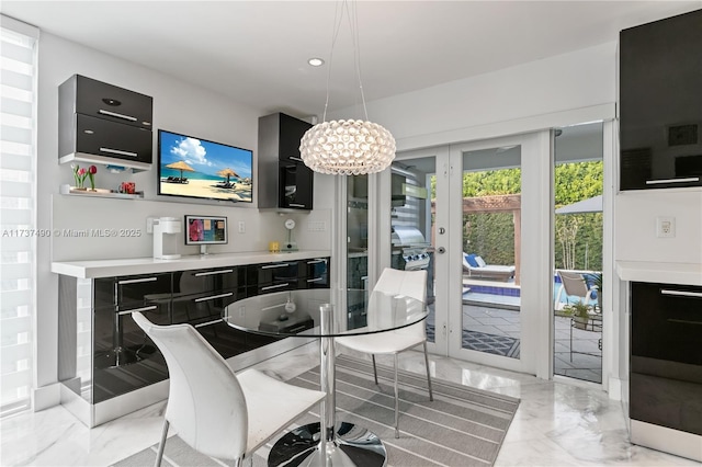 1251 Kane Concourse, Bay Harbor Islands, FL 33154 - dining area with light marble finish flooring, wet bar, recessed lighting, and a chandelier