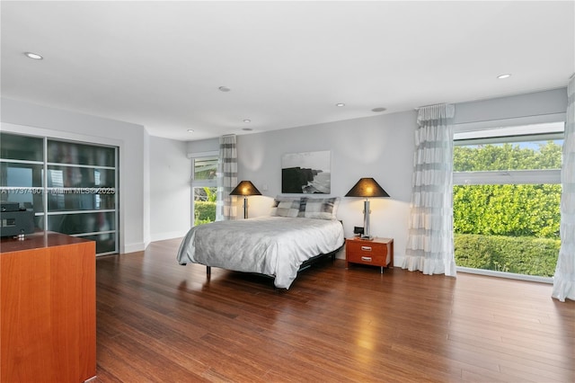 1251 Kane Concourse, Bay Harbor Islands, FL 33154 - bedroom featuring multiple windows, wood finished floors, and recessed lighting