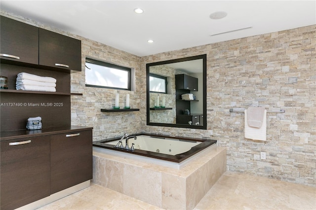 1251 Kane Concourse, Bay Harbor Islands, FL 33154 - bathroom featuring a whirlpool tub, recessed lighting, and tile patterned floors