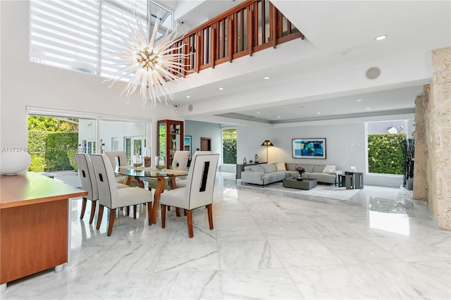 1251 Kane Concourse, Bay Harbor Islands, FL 33154 - dining room featuring marble tiled flooring, a high ceiling, recessed lighting, and a chandelier