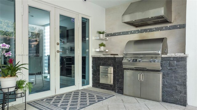 1251 Kane Concourse, Bay Harbor Islands, FL 33154 - view of patio featuring french doors and exterior kitchen