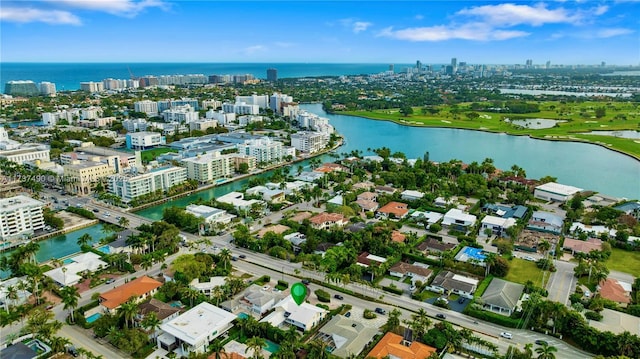 1251 Kane Concourse, Bay Harbor Islands, FL 33154 - aerial view of property and surrounding area with nearby urban area and a large body of water