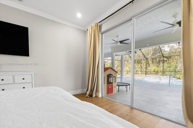 bedroom with ceiling fan, ornamental molding, light hardwood / wood-style floors, and access to outside