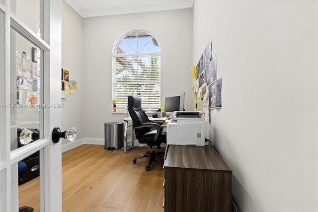 home office featuring light hardwood / wood-style floors