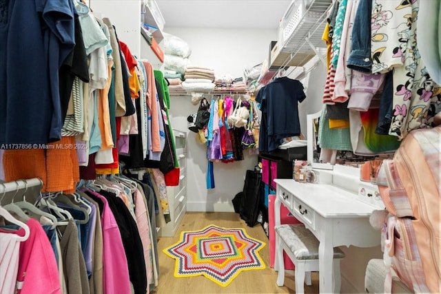 spacious closet with light wood-type flooring