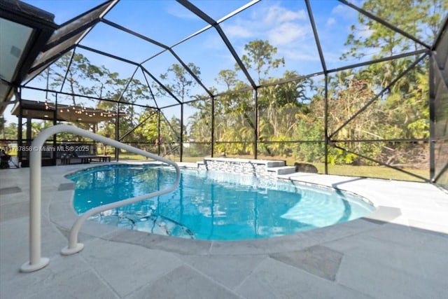 view of pool with a patio and glass enclosure