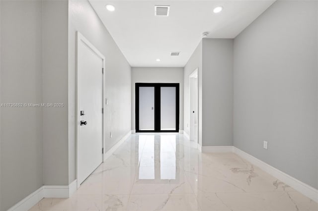 entrance foyer featuring french doors