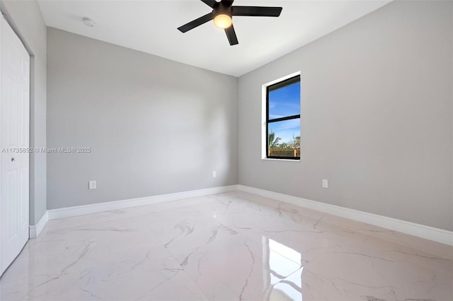 unfurnished room with ceiling fan