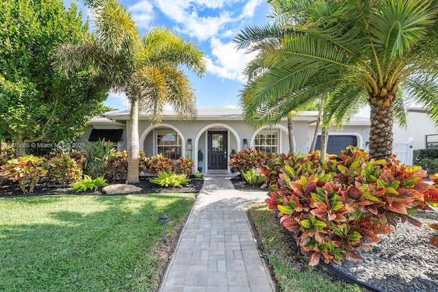 view of front of house with a front yard