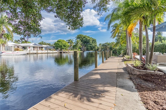 dock area featuring a water view