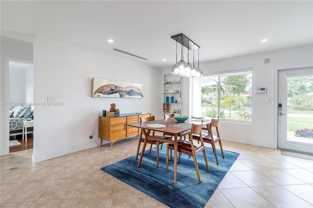 view of tiled dining space