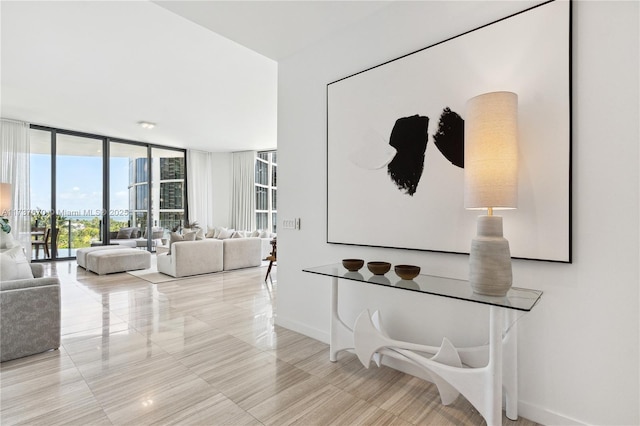 living room with floor to ceiling windows