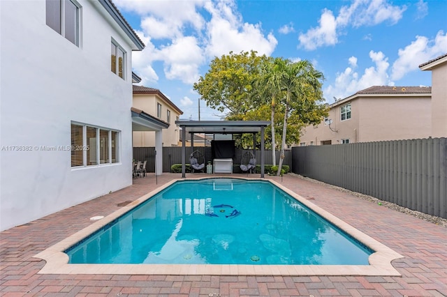 view of swimming pool featuring a gazebo and a patio area