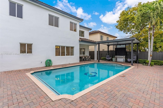 view of pool featuring a patio area