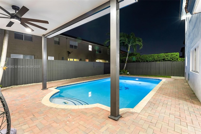 view of pool featuring a patio area and ceiling fan