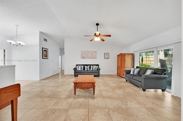 living room with ceiling fan with notable chandelier, vaulted ceiling, a textured ceiling, and light tile patterned flooring