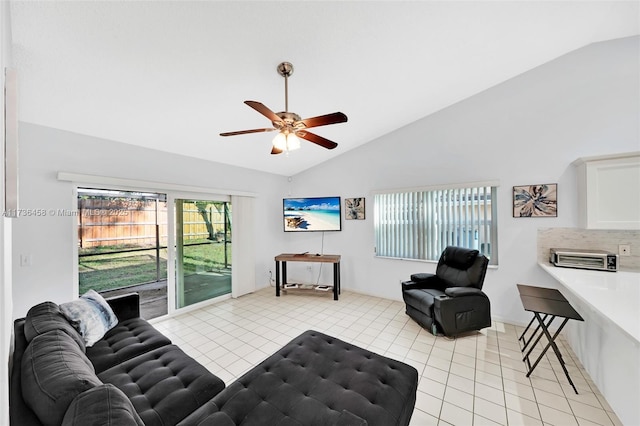 tiled living room with vaulted ceiling and ceiling fan