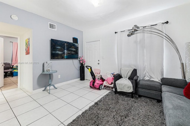 living room featuring light tile patterned floors