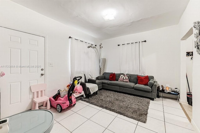 living room featuring light tile patterned floors