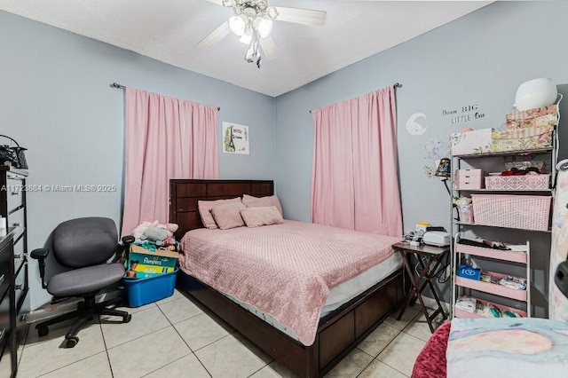 bedroom with light tile patterned floors and ceiling fan