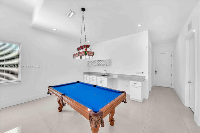 playroom with bar with sink, billiards table, light tile patterned floors, and recessed lighting