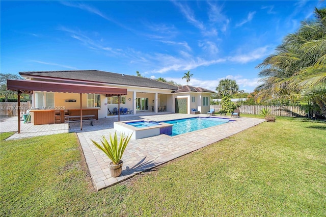 view of pool with a patio area, a fenced backyard, a pool with connected hot tub, and outdoor lounge area