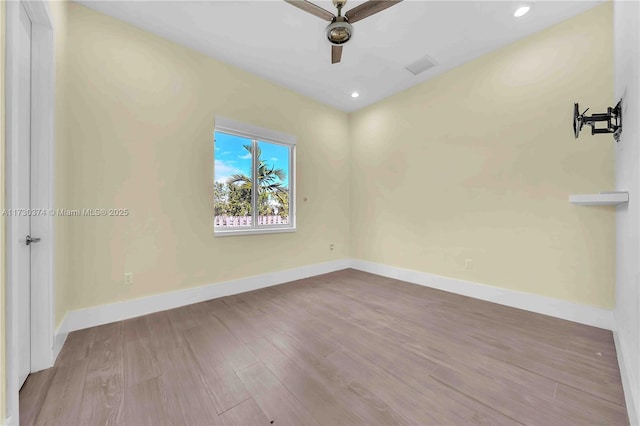 spare room featuring ceiling fan, wood finished floors, and recessed lighting