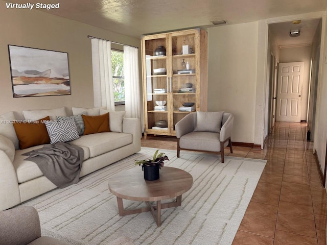 living room featuring tile patterned flooring