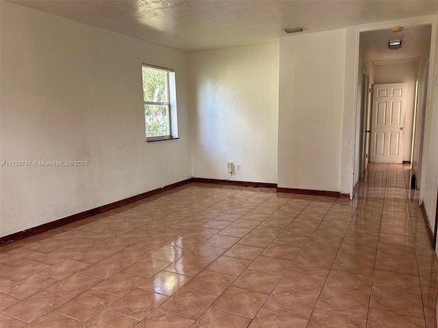 view of tiled empty room