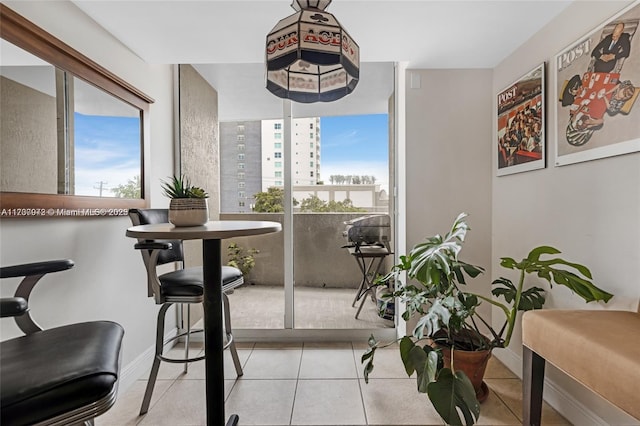 dining room featuring light tile patterned flooring