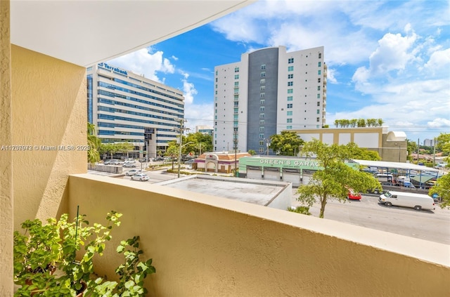 balcony featuring a city view