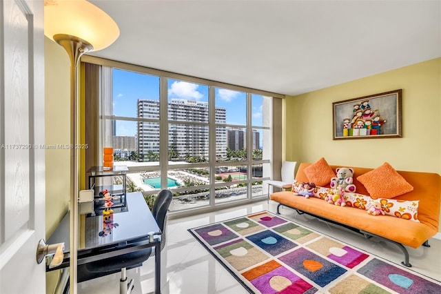 tiled living room with floor to ceiling windows