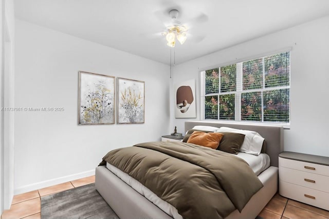 bedroom with light tile patterned flooring