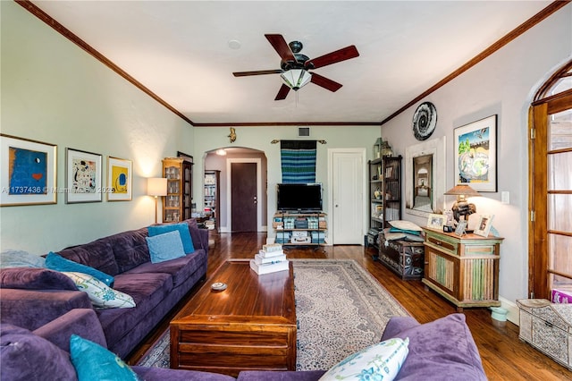 living room featuring crown molding, dark wood-type flooring, and ceiling fan