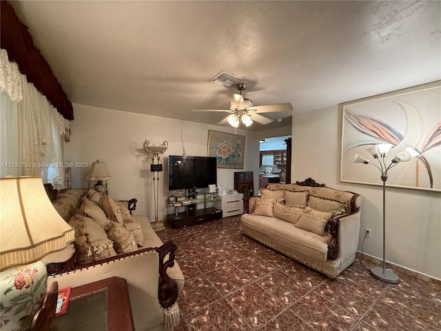 living room featuring ceiling fan