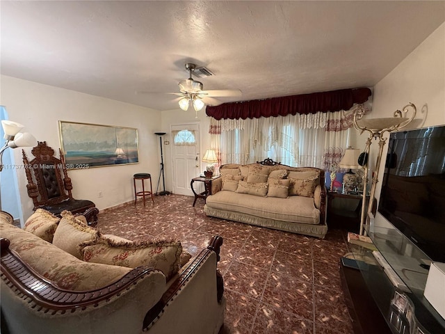 living room with ceiling fan