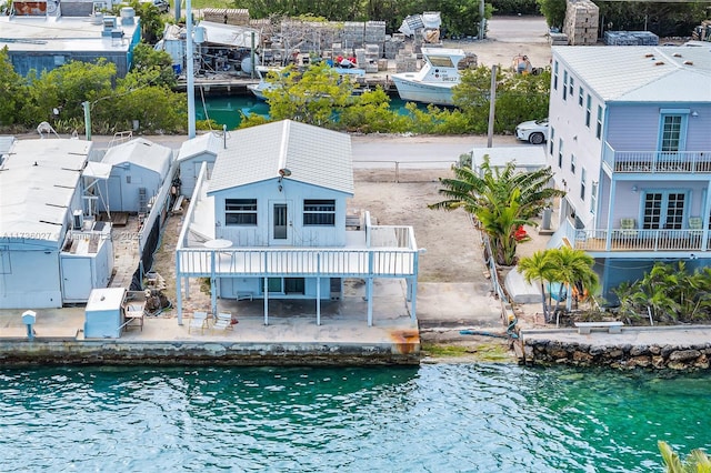 exterior space with a water view