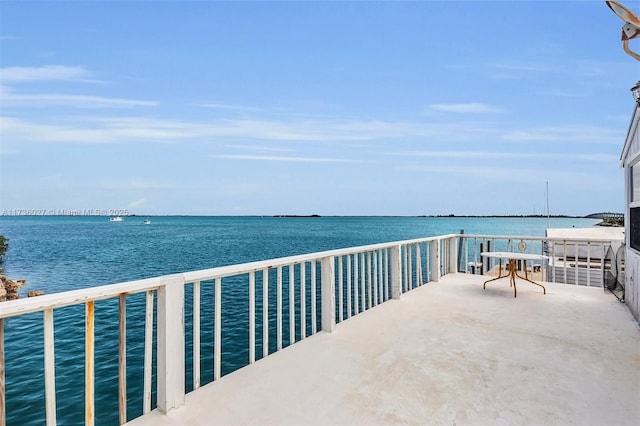 view of patio / terrace with a water view