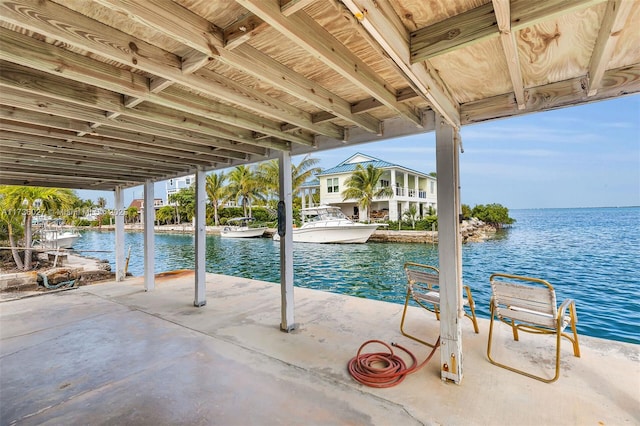 view of swimming pool with a water view