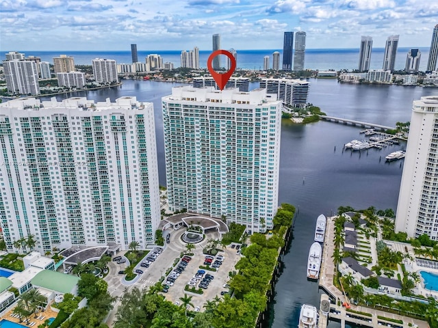 birds eye view of property featuring a water view