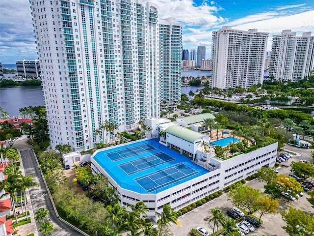 birds eye view of property featuring a water view