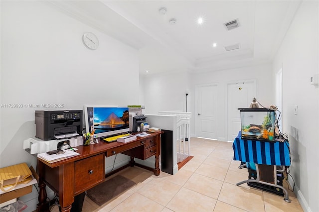 home office featuring light tile patterned flooring and a raised ceiling