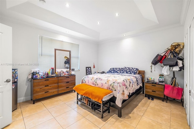 tiled bedroom with crown molding and a tray ceiling