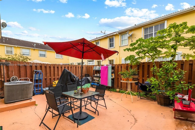 view of patio featuring central AC