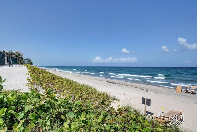 property view of water featuring a beach view