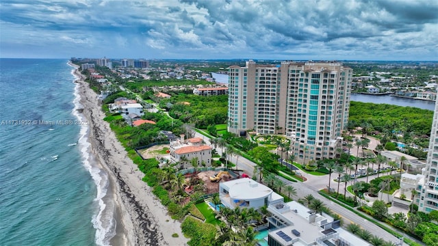 aerial view featuring a water view and a beach view