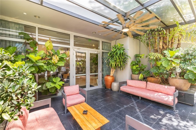 exterior space featuring french doors and ceiling fan