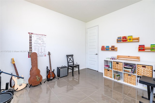 miscellaneous room with tile patterned flooring