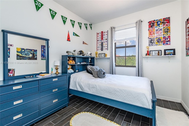 bedroom with lofted ceiling